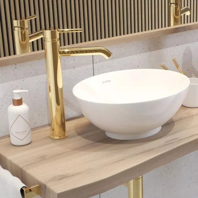 Marmur + złoto = łazienka w stylu maksymalizmu
