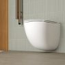 Set of Oltens Hamnes OneForm Stille wall-mounted PureRim WC bowl with SmartClean coating and the Ovan Slim soft close toilet seat, white 42549000 zdj.2